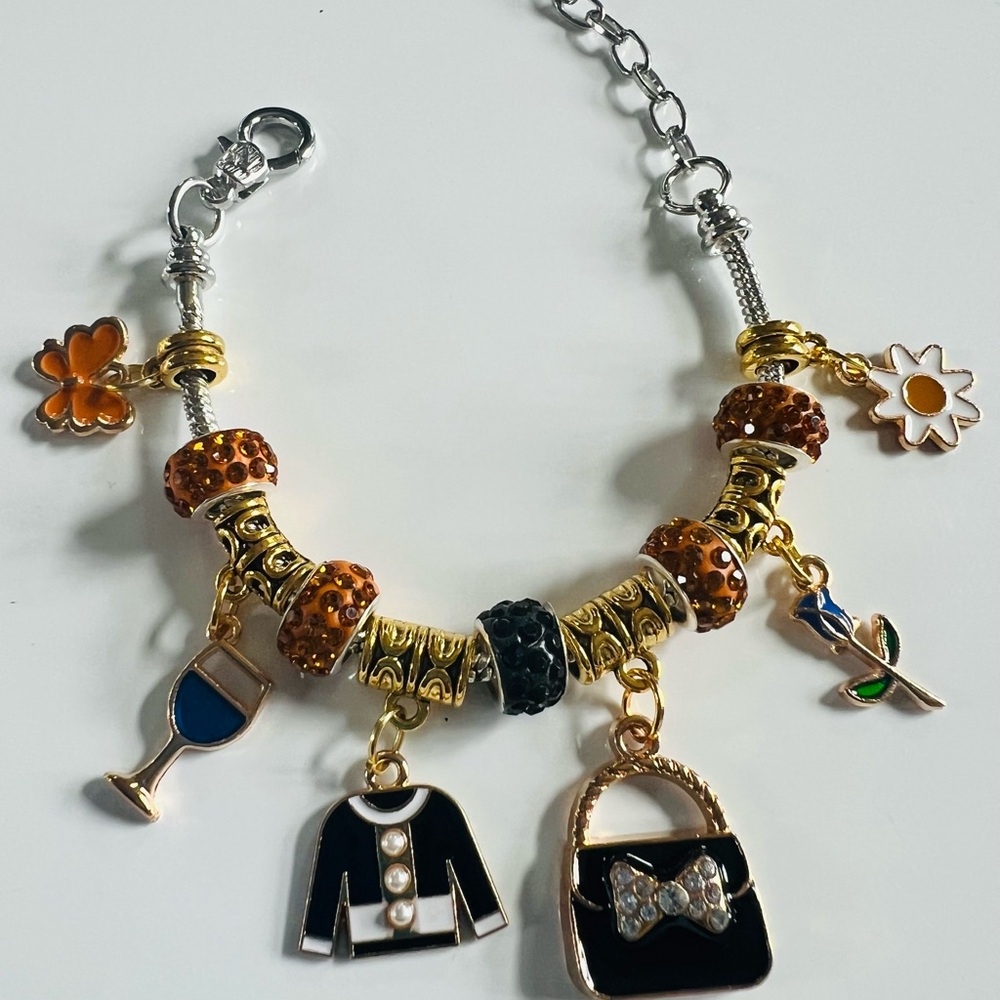Elegant Gold and Black Charm Bracelet